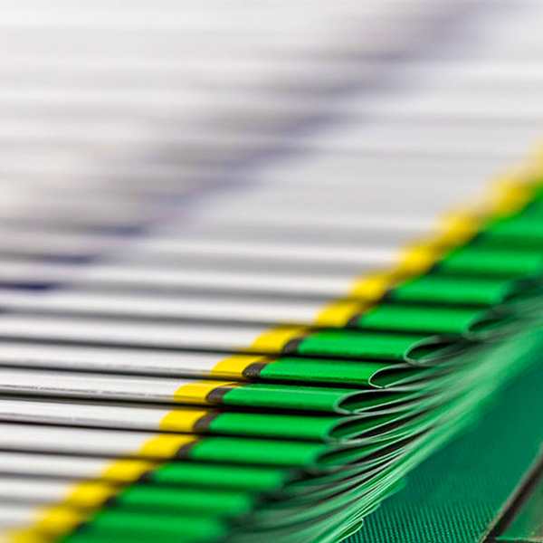 booklets on an assembly line