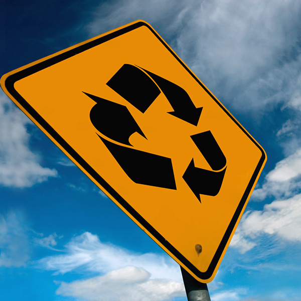 Recycle symbol on a road sign