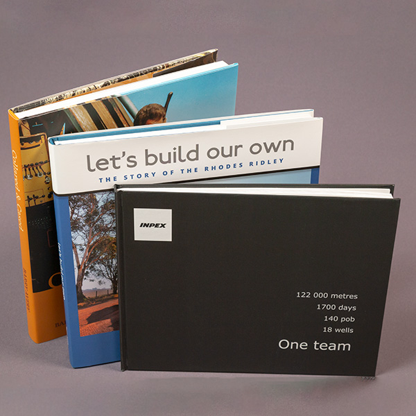 A selection of hard cover books printed by Data Documents.