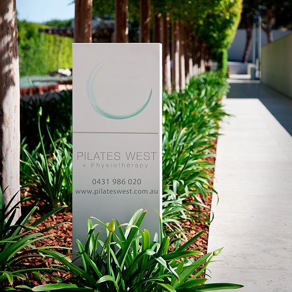 An outdoor sign for a physiotherapist.